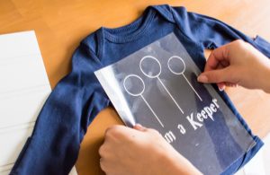 Make an easy baby shower gift for the nerdy mom to be with a silhouette portrait machine! These nerdy baby onesies are perfect for the ultimate Whovian or Potterhead.