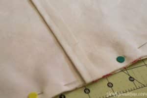 If you love simple sewing projects, you'll love how easy it is to make this envelope pillow! You need two pieces of fabric & an hour out of your afternoon.