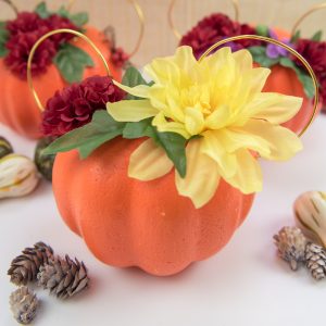 Floral Mickey Ears pumpkin - I hate spending money on pumpkins that mold quickly and make a mess when you carve them. So I'm switching to a simple + cheap version, styrofoam pumpkins from the Dollar Tree, to make my very own Floral Mickey Ears pumpkin!