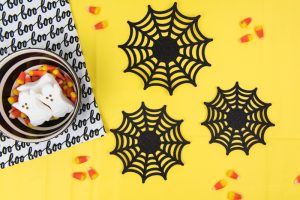 Paper Spider Webs -Get the SVG cut files for these paper spider webs! Make your own family-friendly decor instead this year, it only takes 15 minutes to put together with the Silhouette Cameo!