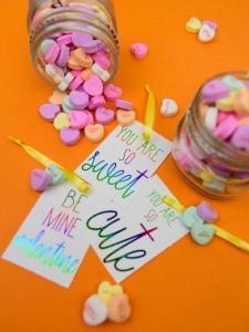 Deco Foil Valentine's Day Tags - I love the look of foil gift tags and never realized how easy it was to do at home! I used my MINC machine and deco foil from Expressions Vinyl to create these candy heart inspired valentines day gift tags!