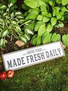 Modern Farmhouse Kitchen Sign - Use your Silhouette Cameo to add a little Farmhouse charm to your kitchen with the FREE farmhouse inspired SVG + PNG file! All it takes is 8 supplies (or less!) to make a one of a kind sign to hang up in your home.