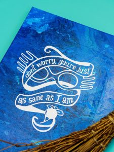 Harry Potter Acrylic Paint Poured Canvas - This poured canvas is the perfect craft night project to DIY with friends! It's fun, messy, and no two canvases will be alike! You can leave them blank or use vinyl and your Silhouette or Cricut machine to dress them up a bit, like with a fun Harry Potter inspired quote or image...or really anything that you like. This craft project is colorful and easy, all you do is mix paint with water and pour!