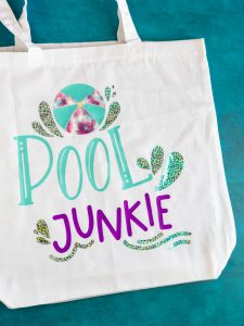 Pool Junkie svg cut file on a beach tote bag